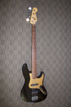 Load image into Gallery viewer, Fender American Deluxe Jazz Bass - 2006 Montego Black