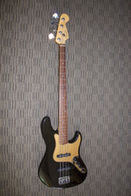 Load image into Gallery viewer, Fender American Deluxe Jazz Bass - 2006 Montego Black

